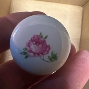 Lot of eight vintage porcelain round drawer pulls.